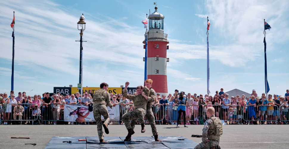 A photograph of people demonstrating fighting on the hoe
